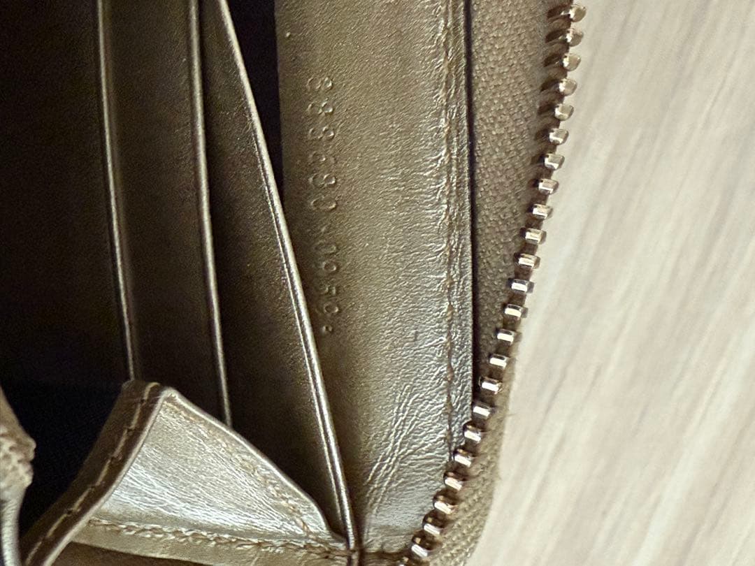 GUCCI ゴールド ロゴパターン リボン付き長財布