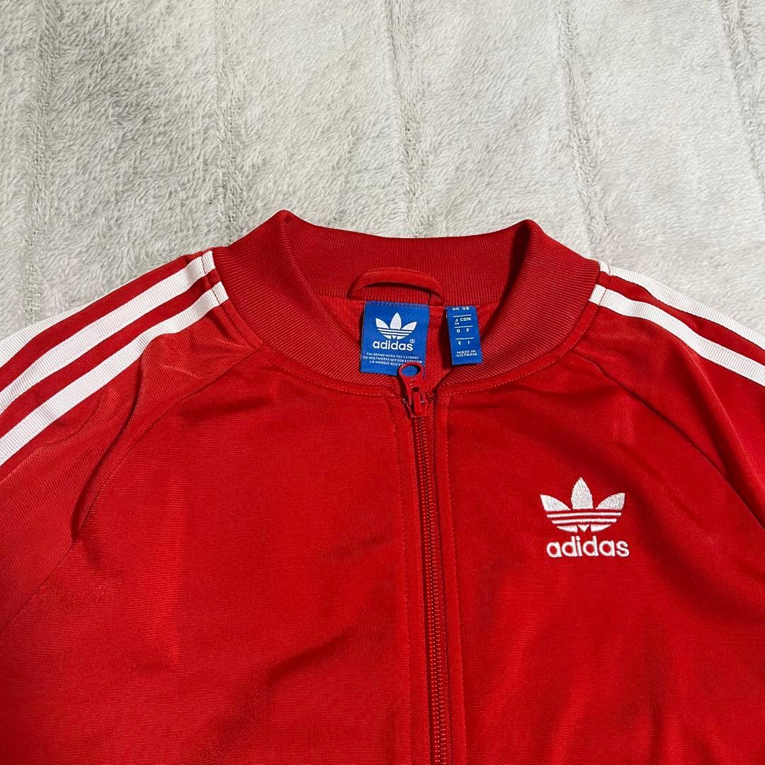 adidas レッド ジップアップジャケット - メルカリ