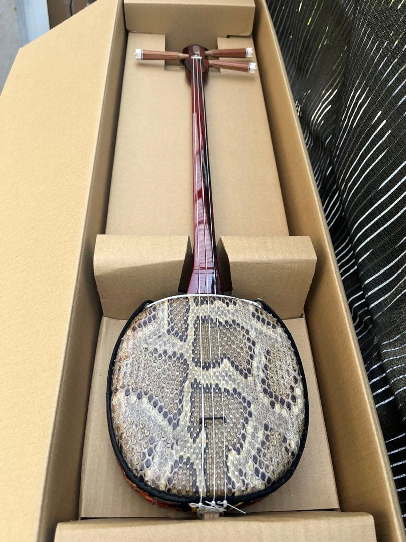 沖縄三線 黒柿(縞杢)小与那城型