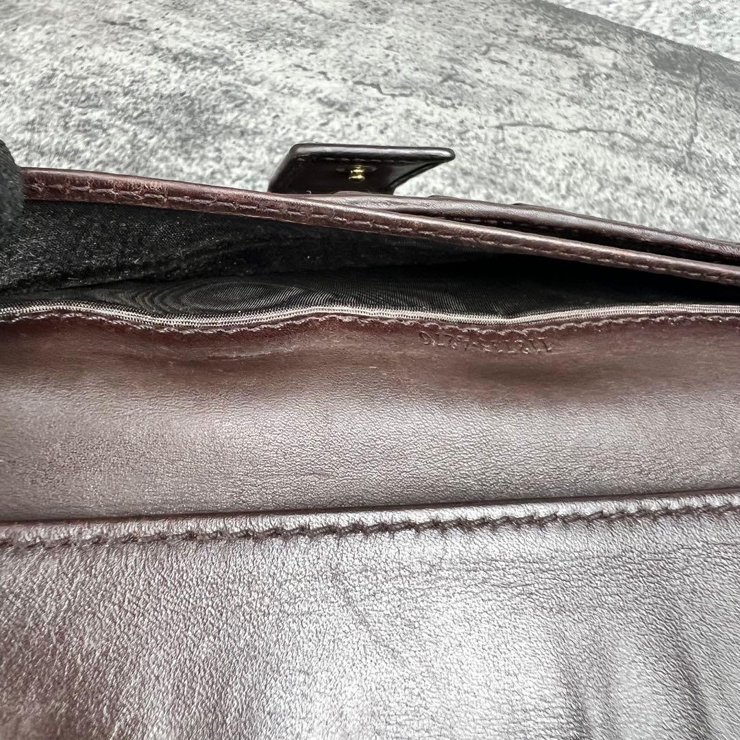 GUCCI GGエンボス レザー 長財布 ダークブラウン Wホック レザー GUCCI