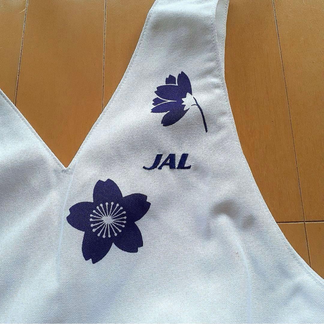 JALスチュワーデス歴代制服エプロン - メルカリ