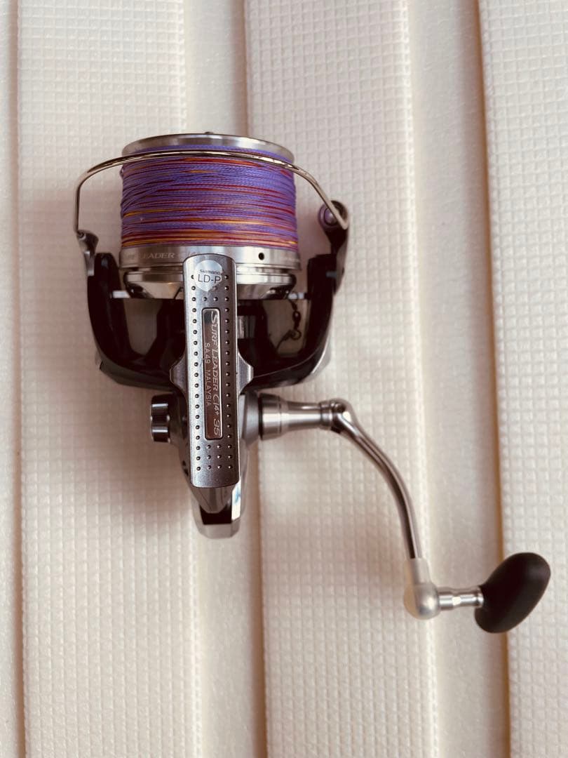 シマノ　スピニングリール 金属製 紫色ライン 楽天市場】【処分品】 スピニングリール ねじ込み式 リール 5000番 5+1