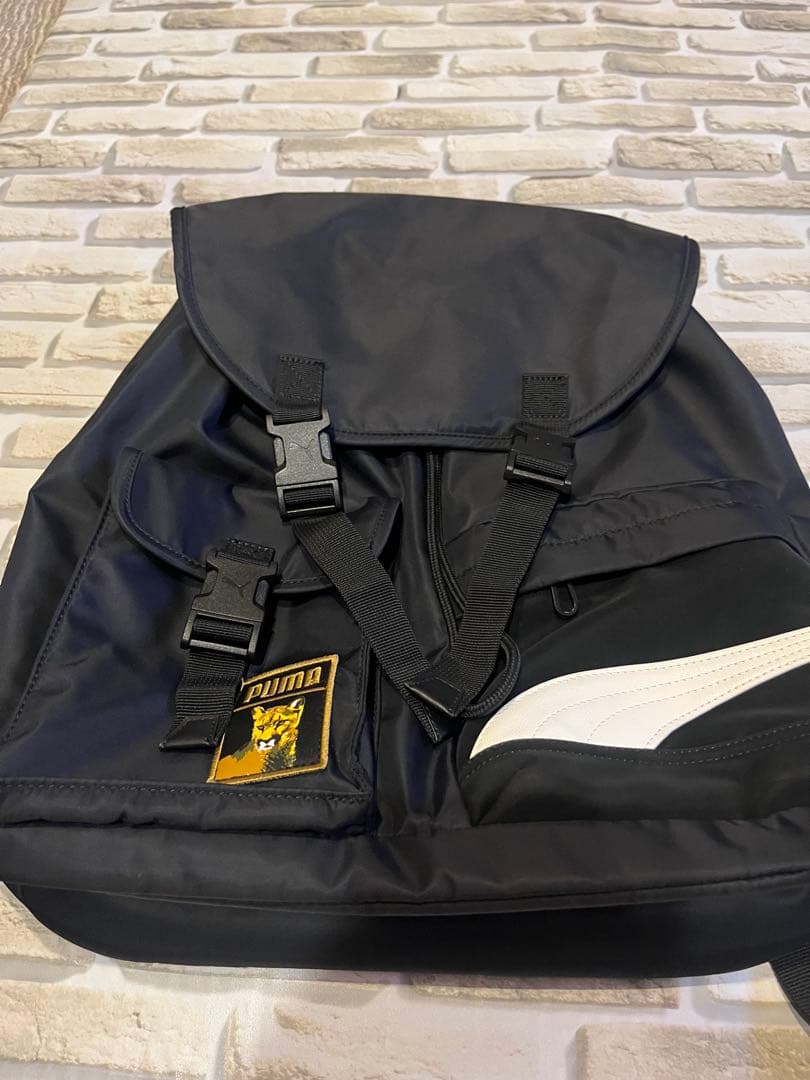 PUMA×ear コラボフラップリュック イアパピヨネ プーマの通販はau PAY