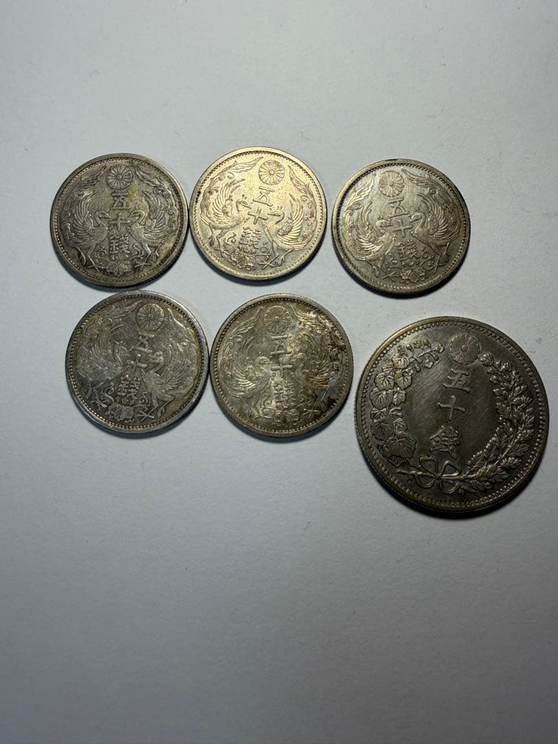 鳳凰50銭銀貨5枚 竜50銭銀貨明治34年セット　古銭まとめ五十銭銀貨 小丸50銭】小型鳳凰五十銭銀貨はいくらで売れる？偽物もご紹介
