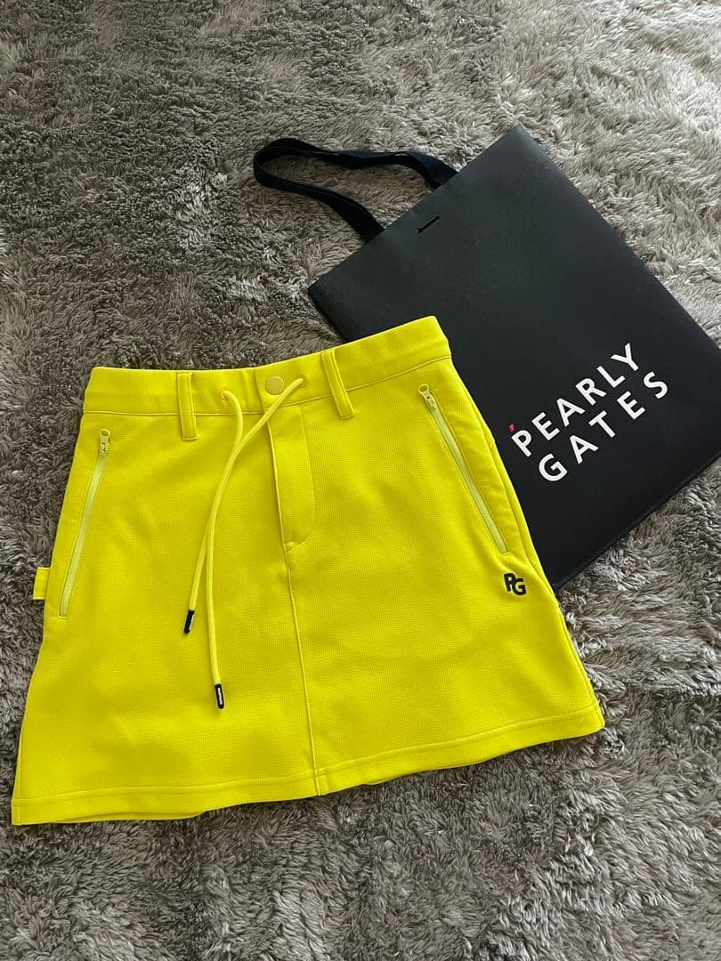 1回着用】PEARLY GATES イエローフレアスカート00 - メルカリ