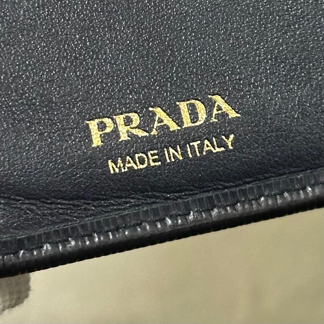 PRADA プラダ 折り財布 ネイビー ラウンドファスナー ゴールドロゴ