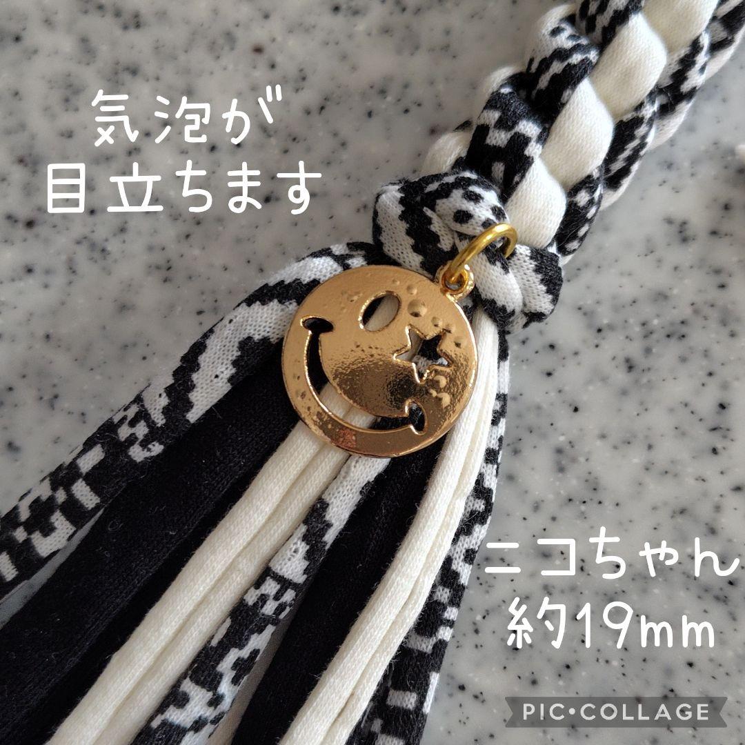 ゴルフ ティーホルダー ニコちゃん スマイル オルテガ モノトーン