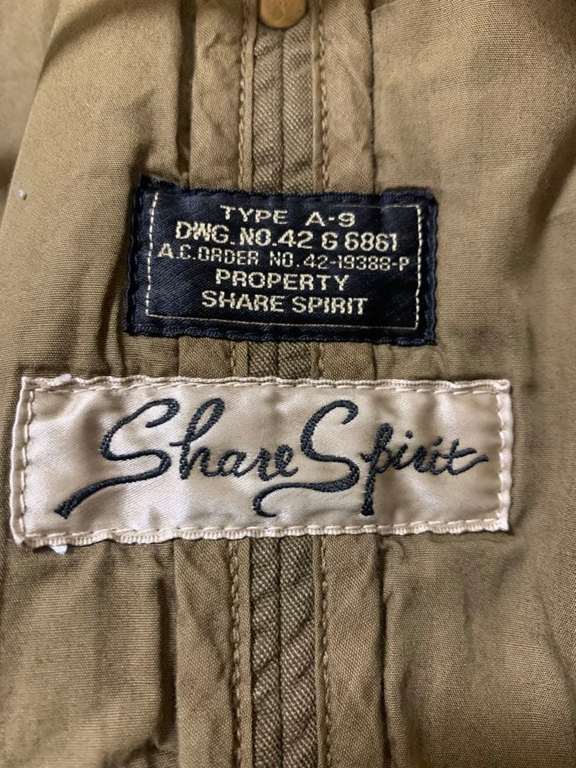 Share spirit” double zip mods coat