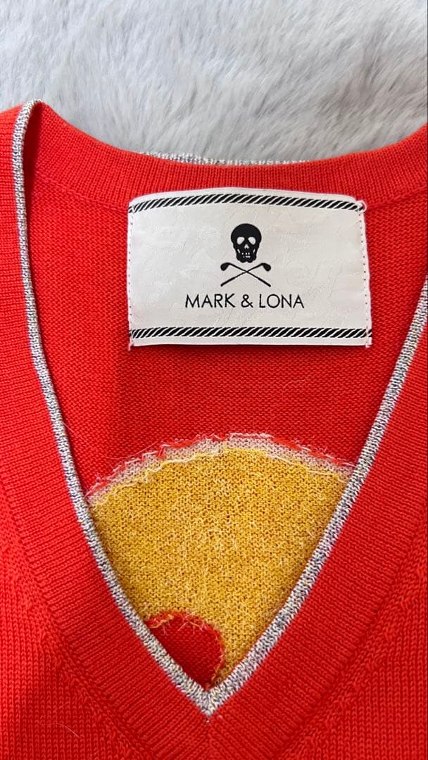 MARK & LONA オレンジ スカル Vネック ベストの通販はau PAY