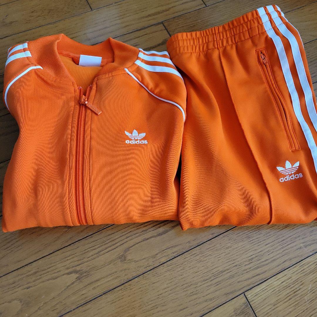 adidas オレンジ ジャージ 上下セット - メルカリ