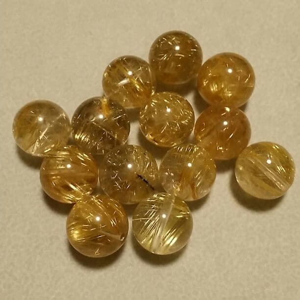 ✨超高品質ルチルクォーツ４A 約１２㎜ 楽天市場】【20.03ct】ルチルクォーツ（片穴）約15×20.2mm ルース 裸石